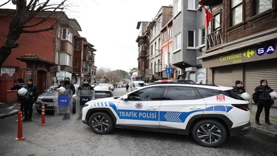 ISTANBUL, TURKIYE - JANUARY 28: Police officers block the road to ensure security and inspect the site after two unidentified armed men opened fire on people attending Sunday service at Santa Maria Church and killing one, in Istanbul's Sariyer district, Turkiye on January 28, 2024. (Photo by Bunyamin Celik/Anadolu via Getty Images)